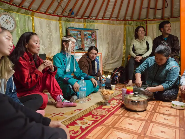 Mongolian nomads are at their daily tasks, such as dairy processing, traditional cuisine, music, animal care, milking, livestock guarding and more