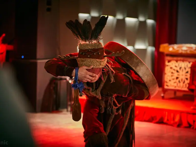 Mongolian dancing with folkloric costumes and instrument