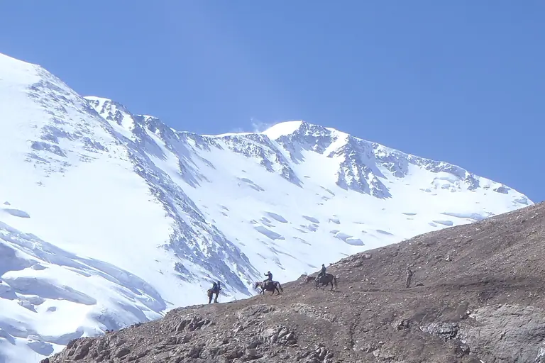 Horseback riding at BC peak Lenin