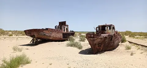 The Moynaq Cemetery Ship, also known as the Moynaq Ship Graveyard, is a haunting and symbolic sight located in the town of Moynaq in Uzbekistan