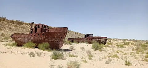 The Moynaq Cemetery Ship, also known as the Moynaq Ship Graveyard, is a haunting and symbolic sight located in the town of Moynaq in Uzbekistan
