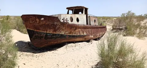 The Moynaq Cemetery Ship, also known as the Moynaq Ship Graveyard, is a haunting and symbolic sight located in the town of Moynaq in Uzbekistan