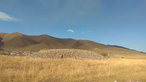 Scythian's stones of San Tash on the eastern territory of Kyrgyzstan, near the border with Kazakhstan