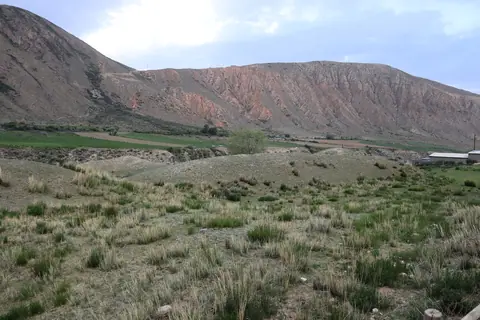 Ruins of an ancient caravanserai and fortress in the gorge of Barskoon, Issyk Kul, Kyrgyzstan