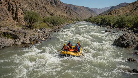 Dynamic rafting scene on the Ili River in Kazakhstan