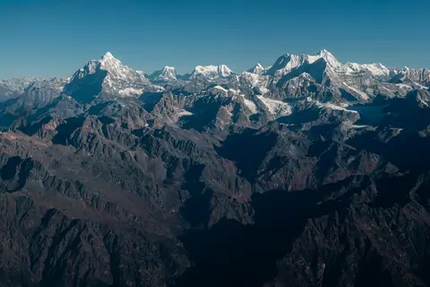 Aerial view of the Himalayan peaks as seen from a flight from Kathmandu, Nepal/ Dhruvin Pandya on Unsplash