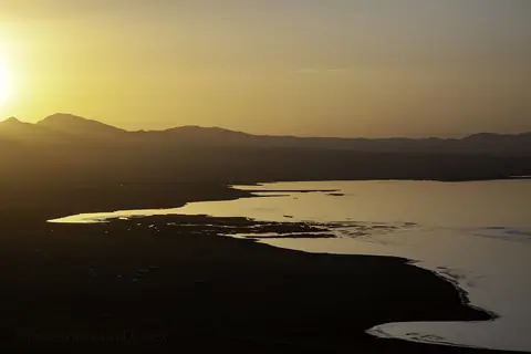 Sunset on the shore of Son Kul lake