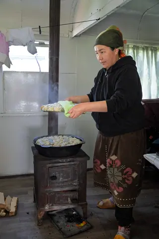 Albina preparing manti at Ak Tash camp