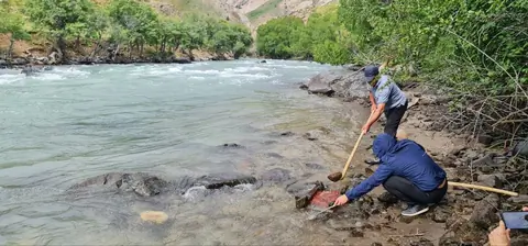 People searching for gold in the Chatkal river
