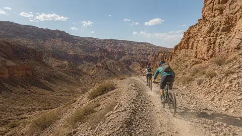 Mountain biking action in the Charyn Canyon, Kazakhstan