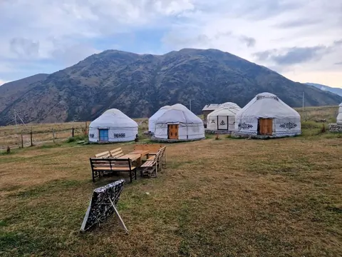 White yurt at Aitoo's home in the mountain of Tuura Suu village