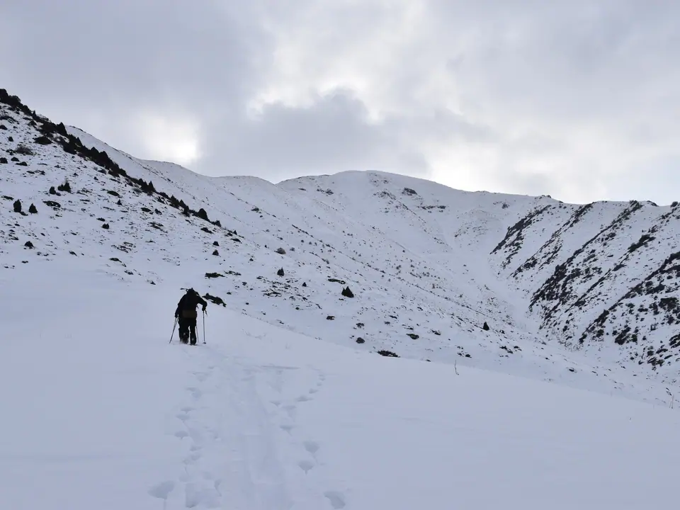 Ski touring to the 3000 noname peak backside Oruusay resort