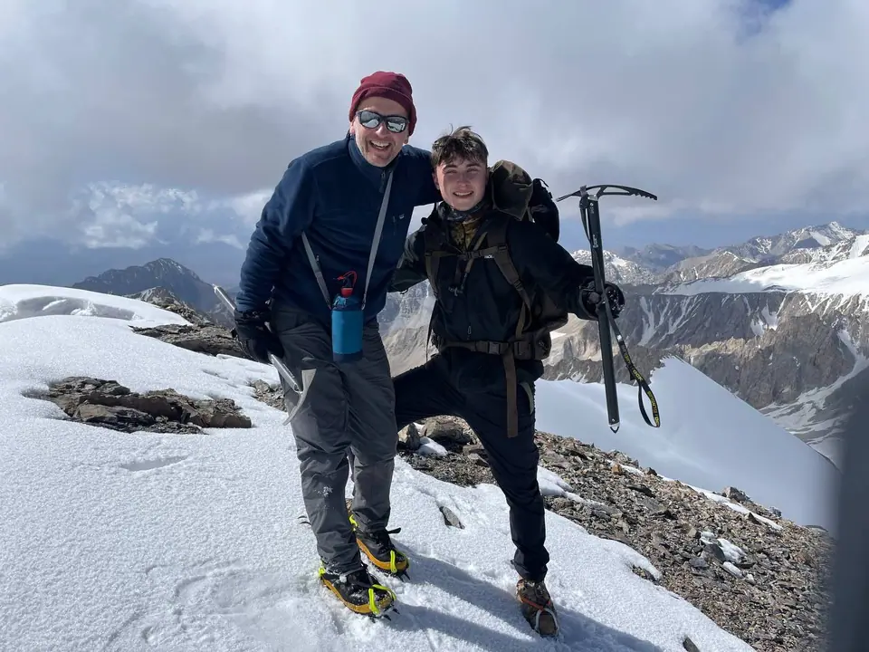 Our two friends on the snowy top of the peak Skobolev in the Kyrgyz Pamir range, Chong Alay district