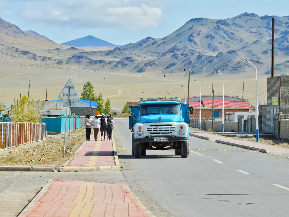 Russian blue truck in the street of Sagsay village in Altaï region of Mongolia