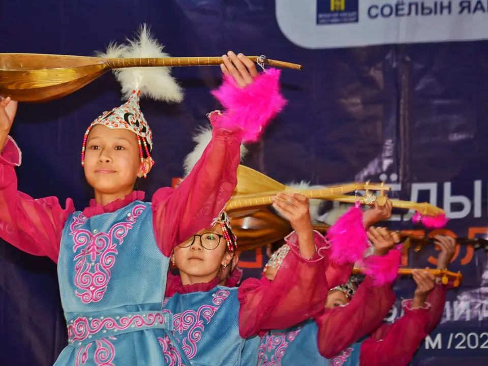 Kazakh girls from Mongolia dancing at the cultural center of Sagsay