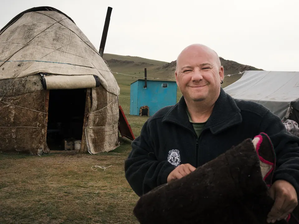 Tourist and yurt at Son Kul