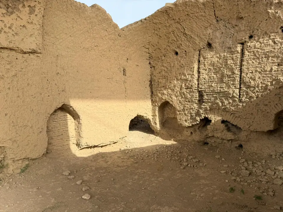 Archaeological remains in Balkh, Afghanistan, traditionally believed to mark the birthplace of the poet Rumi—crumbling mud-brick walls in a dry, historic landscape.