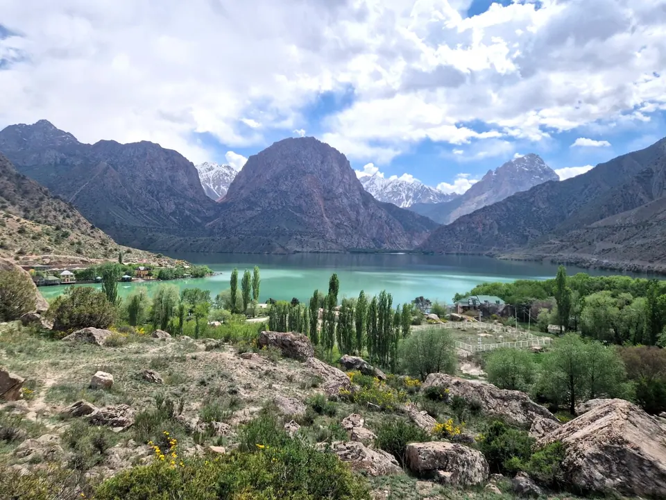 Wide view of the Hat of the Great Alexander and the turquoise lake of Iskenderkul