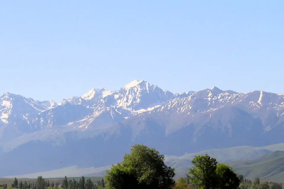 The peak Jiluu Suu stand snowcapped part of the Teskei Alatoo range