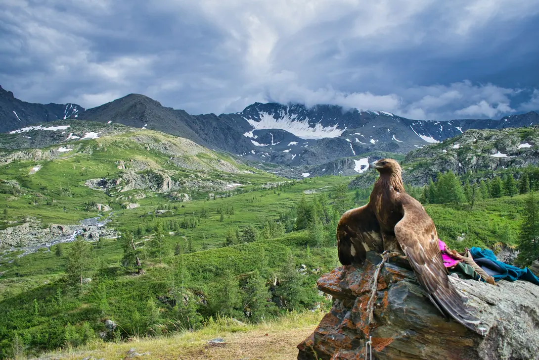 a mountain with a valley below