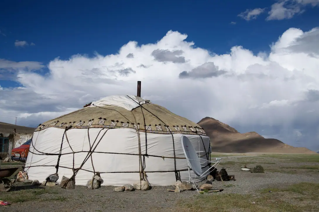 White yurt under the blue Tajik sky