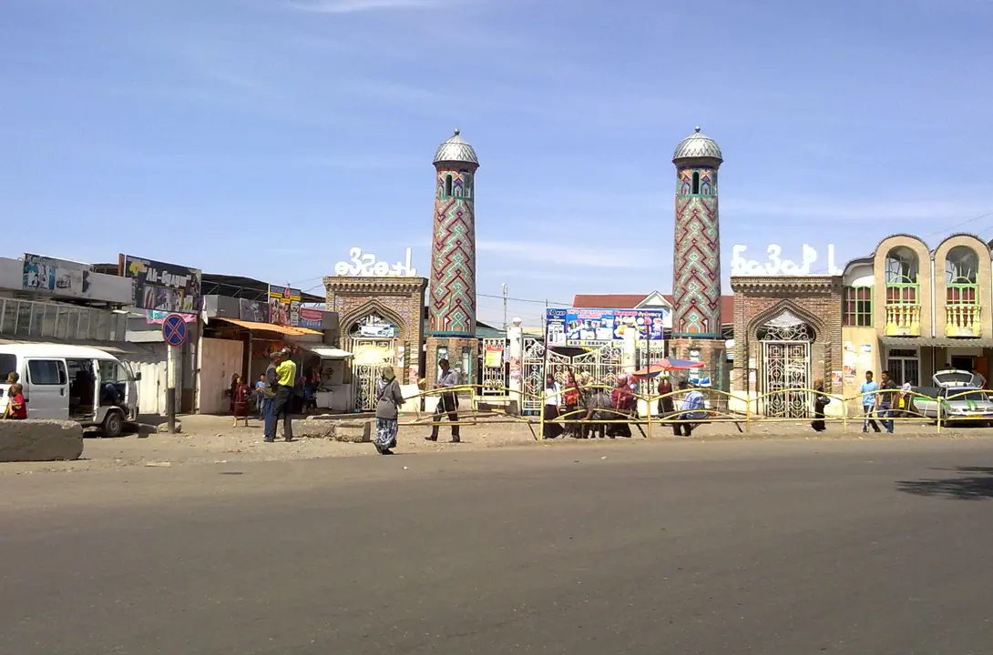 Main entrance of the markent of Uzgen with two small minaret
